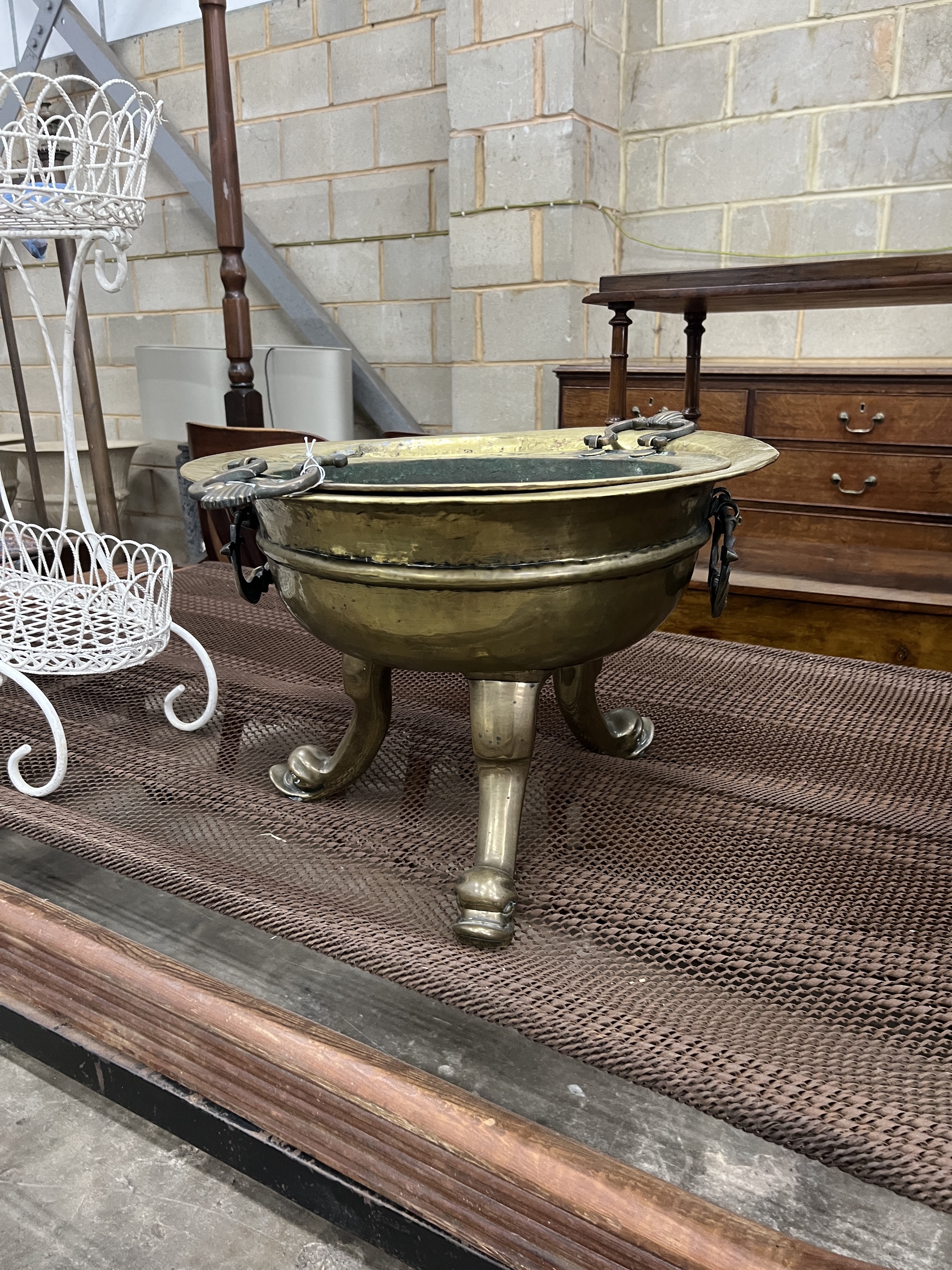 An Eastern circular brass incense burner, diameter 52cm, height 36cm